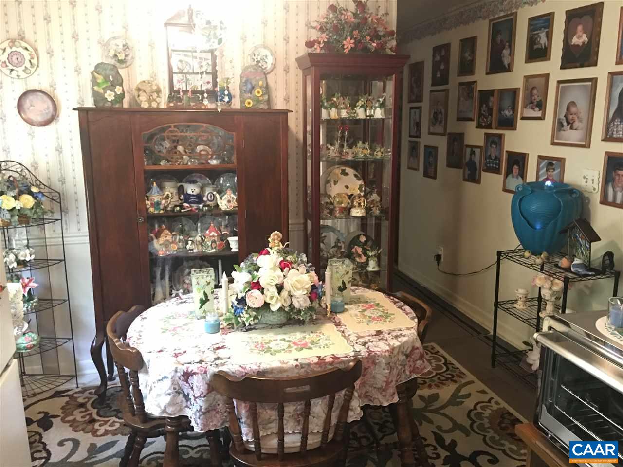 1715 Oneals Road Madison, VA 22727 - Photo 6 of 11 a dining room with furniture and chandelier