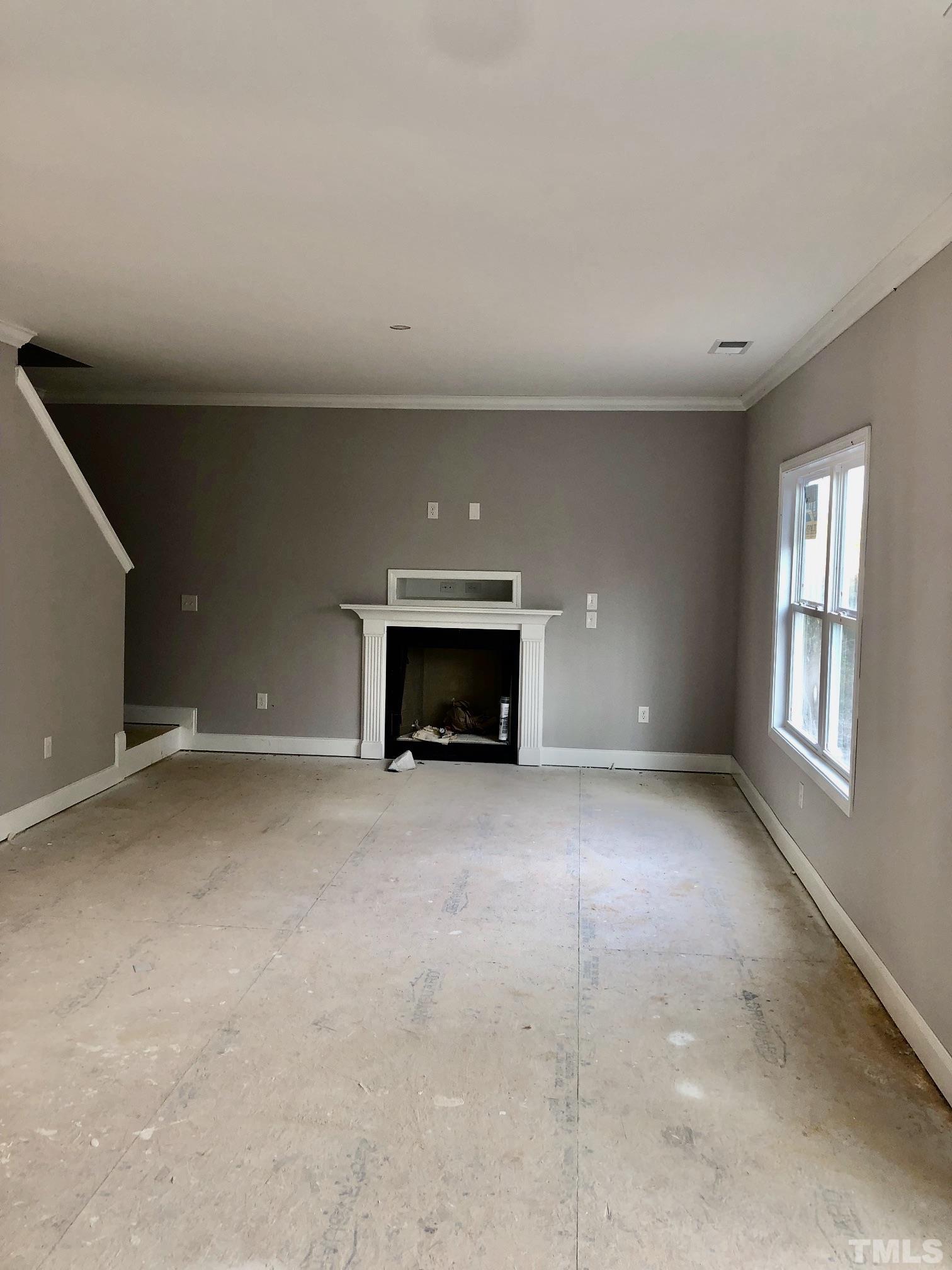 830 Mulberry Road Spring Hope, NC 27882 - Photo 17 of 18 a view of empty room with a fireplace