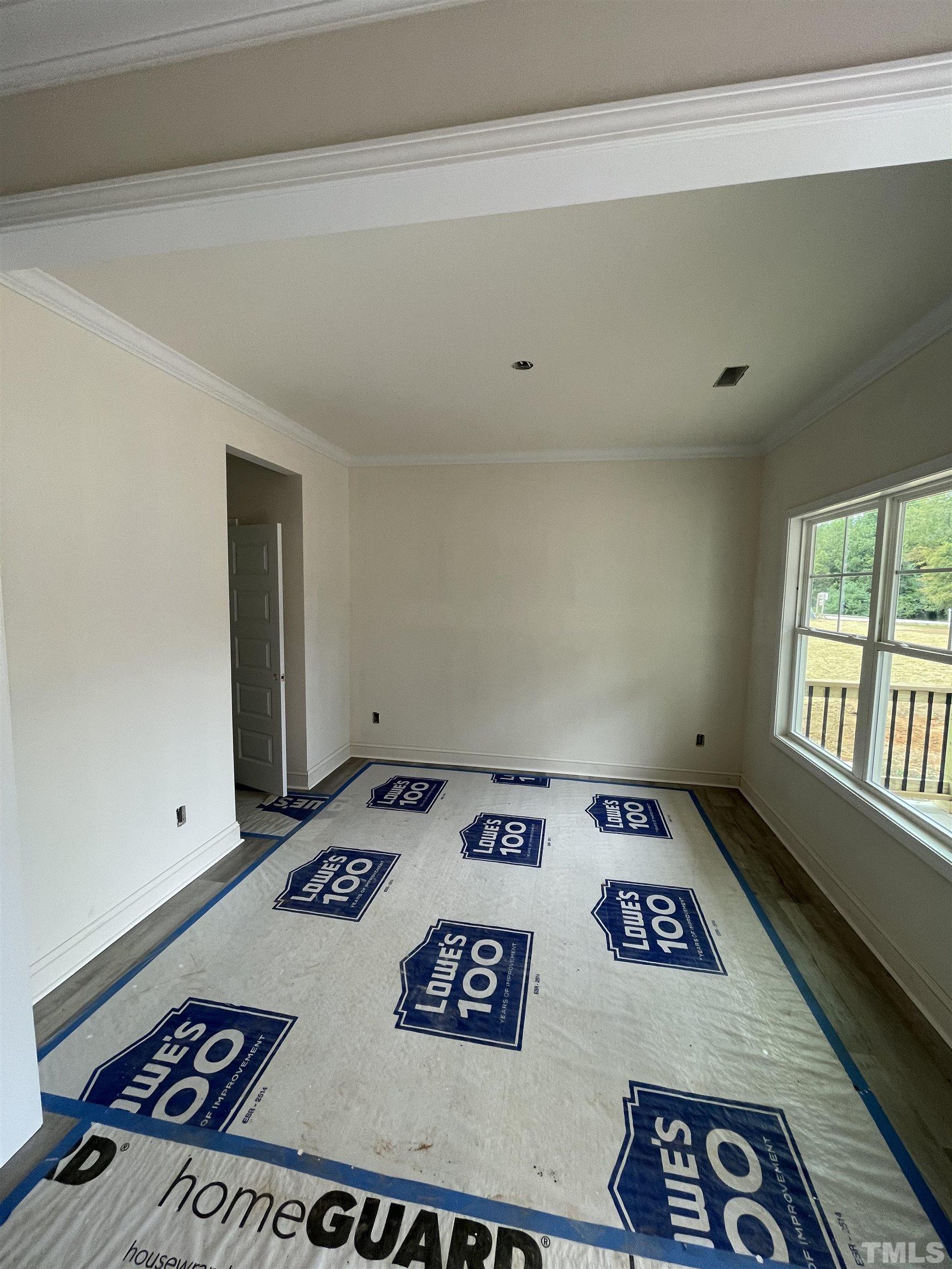 830 Mulberry Road Spring Hope, NC 27882 - Photo 6 of 18 a view of an empty room and window