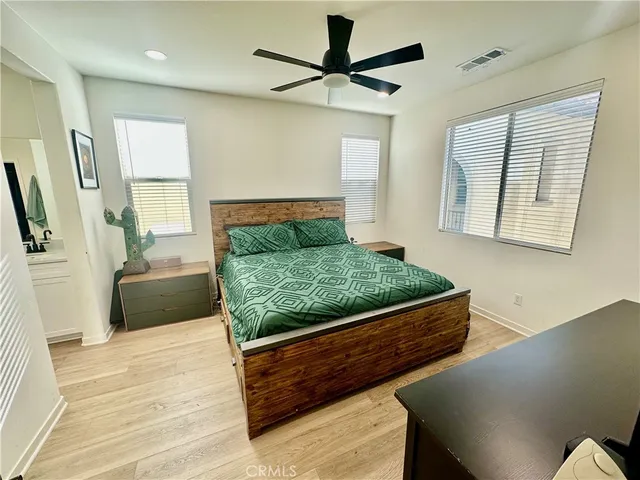 a living room with furniture rug and window