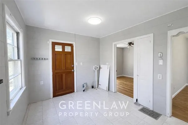 a view of room with window and hardwood