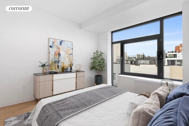 a view of a workspace with furniture