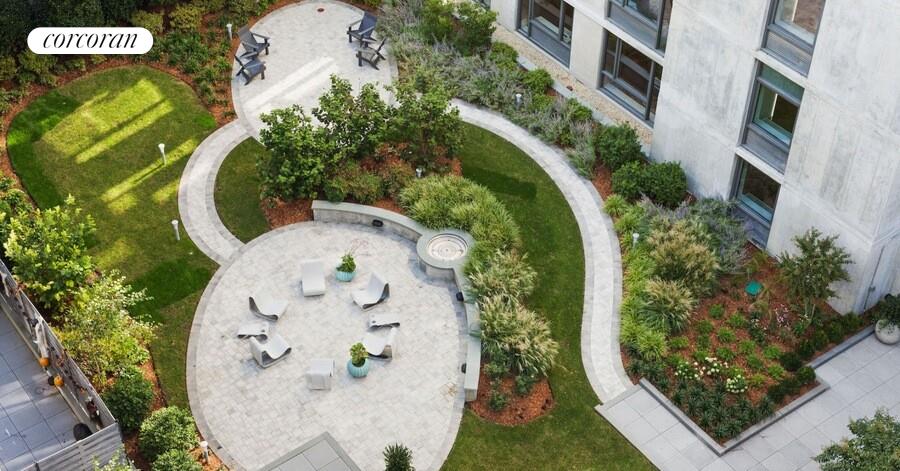 247 North 7th Street, Unit 2 308 Brooklyn, NY 11211 - Photo 9 of 15 an aerial view of a swimming pool with outdoor seating and yard