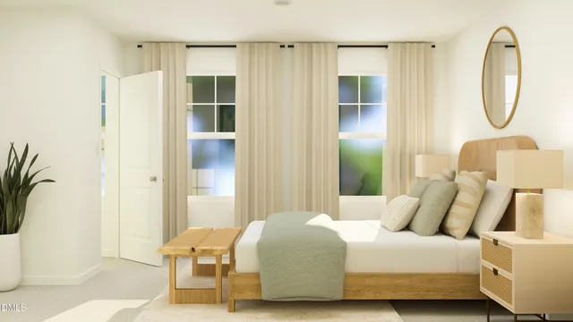 a bedroom with a bed and a mirror