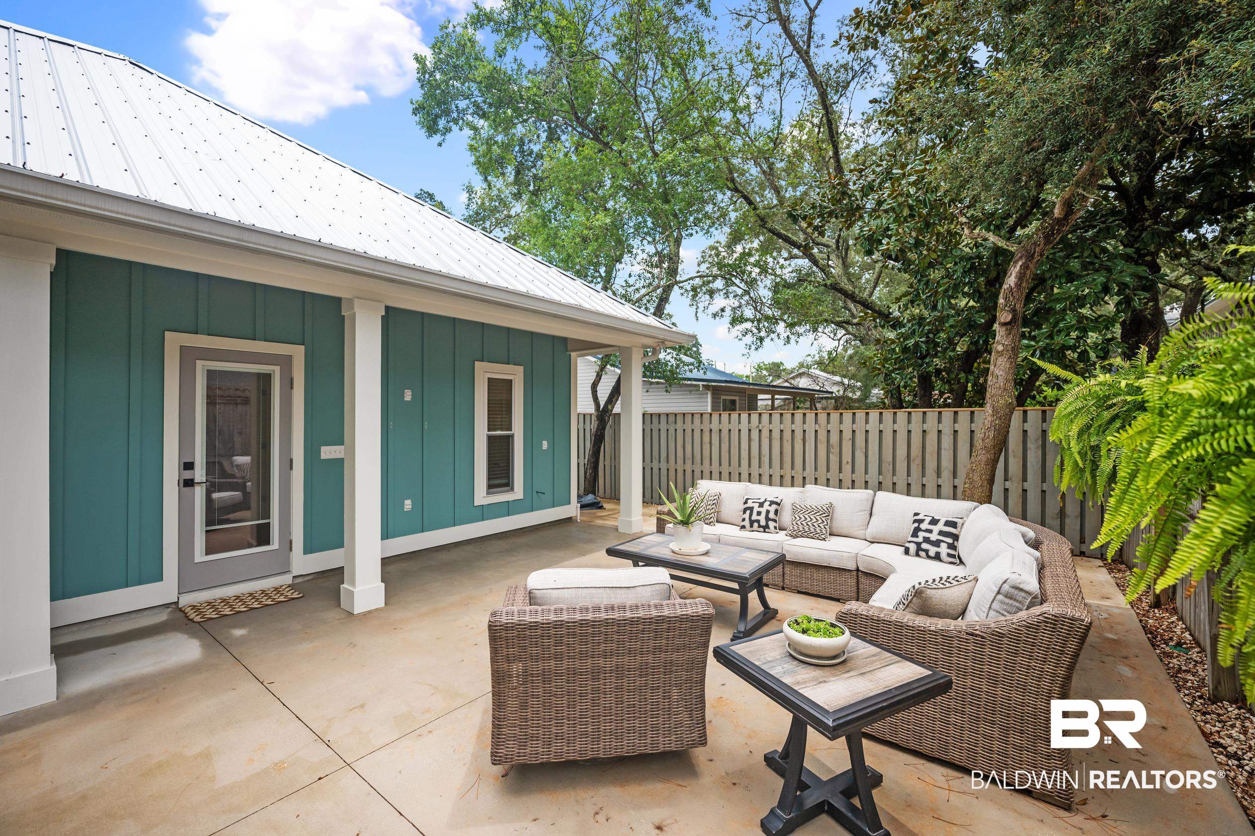 5501 Mobile Avenue Orange Beach, AL 36561 - Photo 22 of 40 Fenced backyard featuring outdoor lounge area and a patio