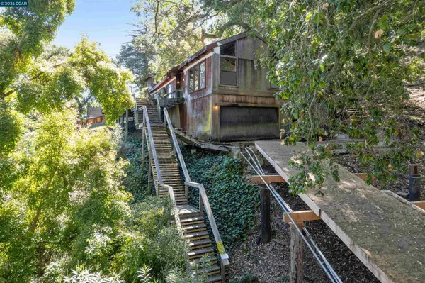 a balcony with wooden floor