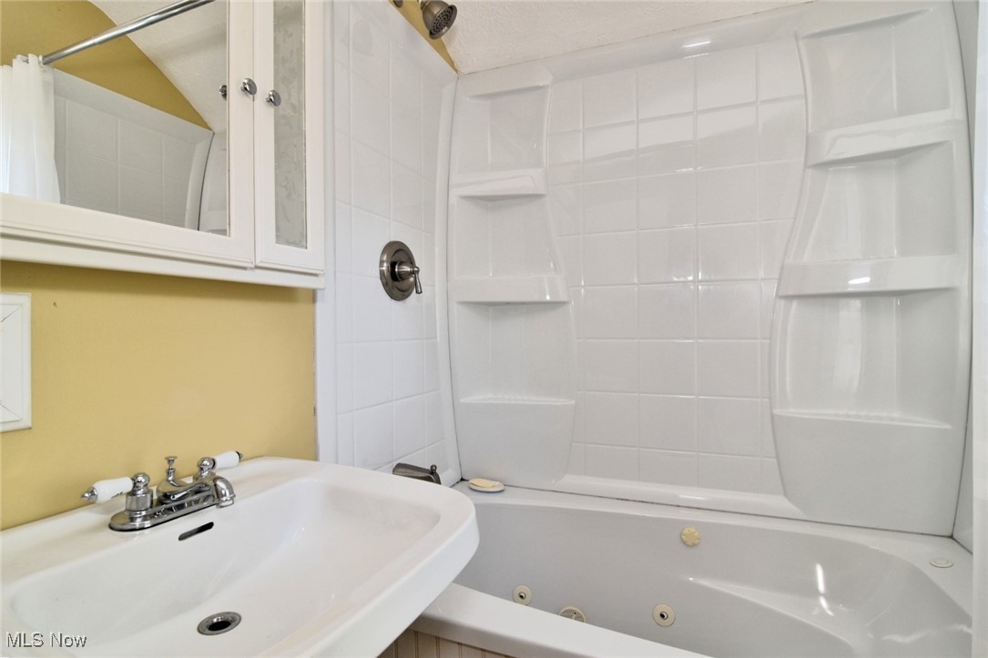 3679 Fenley Road Cleveland Heights, OH 44121 - Photo 29 of 45 Full bathroom with a combined bath / shower with jetted tub and a sink