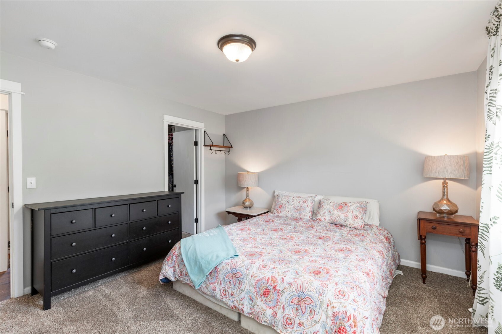 2954 Lowren Loop Port Orchard, WA 98366 - Photo 13 of 30 a bedroom with a bed and a lamp