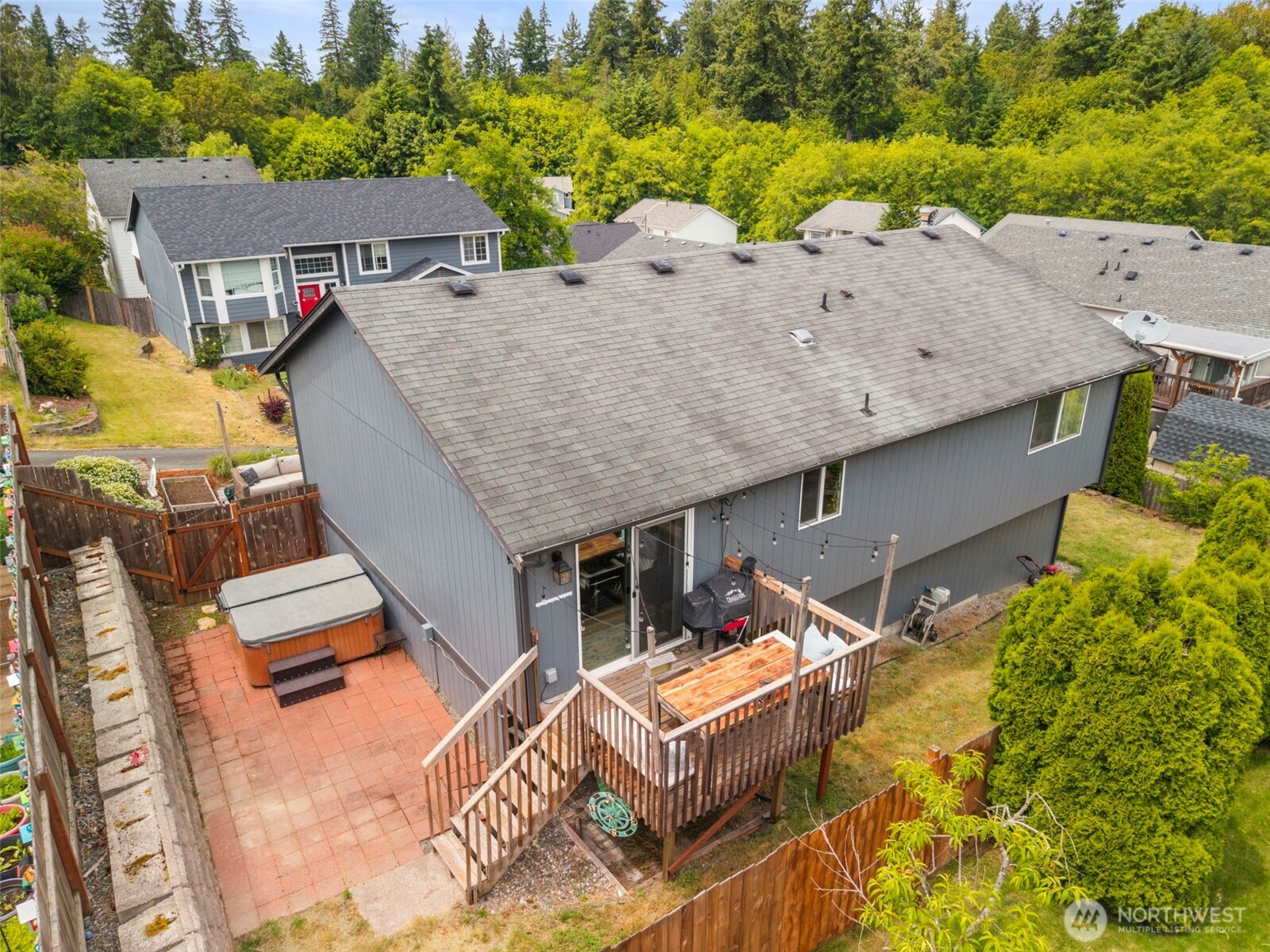 2954 Lowren Loop Port Orchard, WA 98366 - Photo 25 of 30 an aerial view of a house with a swimming pool