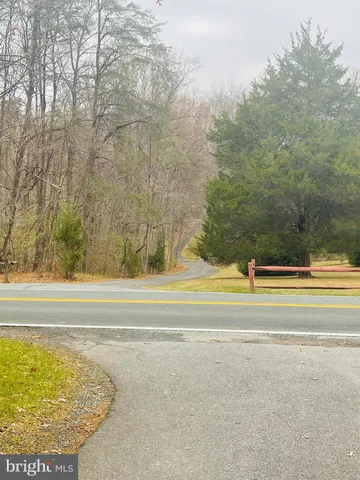 a view of swimming pool with an outdoor space and seating area