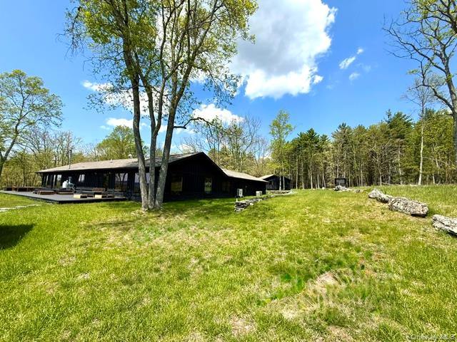 125 Mapes Road Barryville, NY 12719 - Photo 36 of 37 a view of a house with a yard