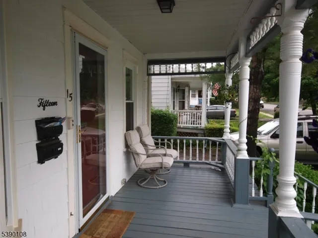 a view of balcony with furniture