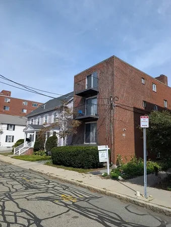 a front view of a building with street