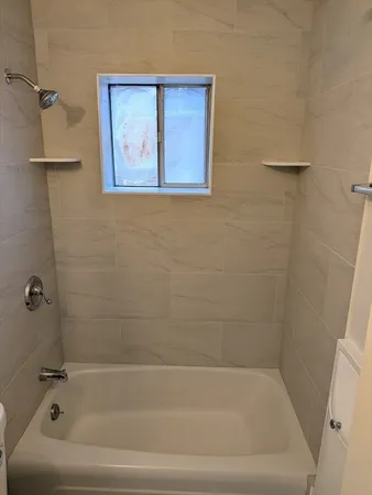 a bathroom with a bathtub