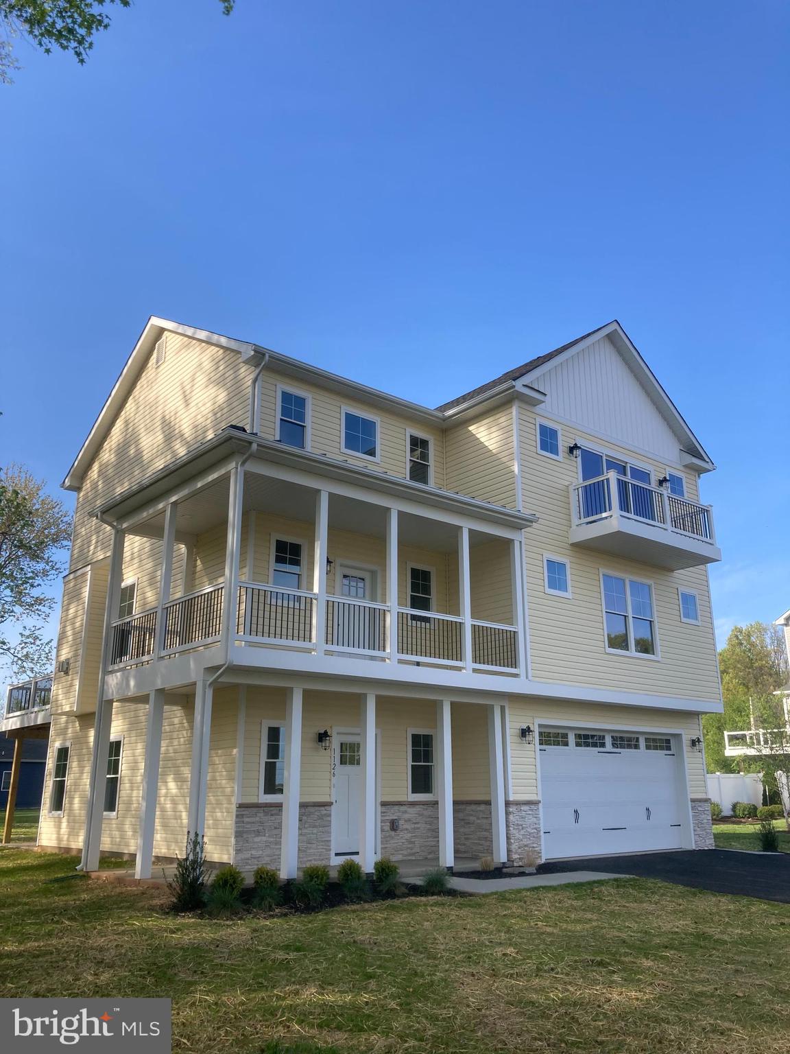 1126 Chester Road Middle River, MD 21220 - Photo 2 of 3 a front view of a house with a garden