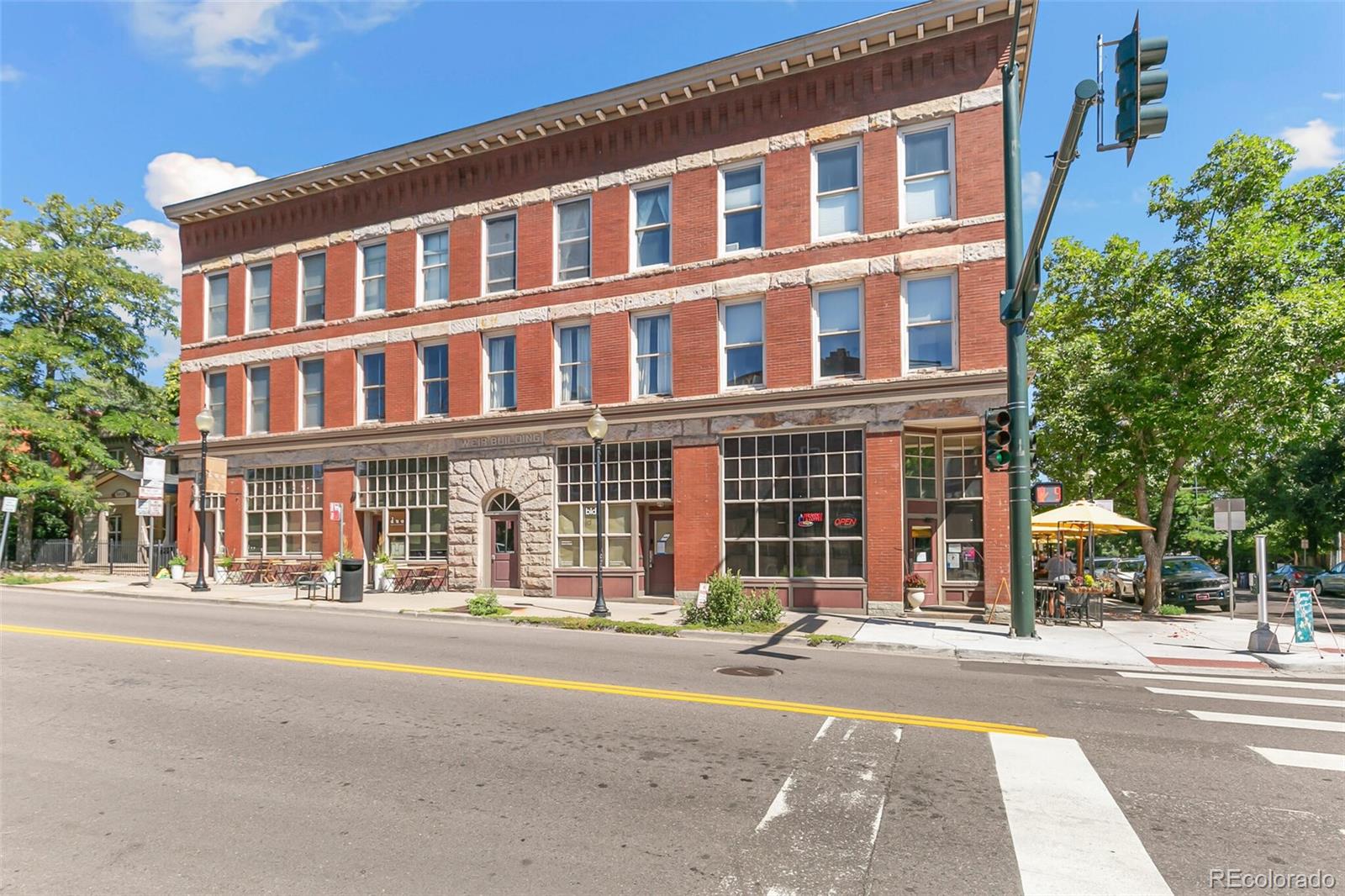 3211 Zuni Street, Unit 4 Denver, CO 80211 - Photo 2 of 35 a front view of building with a street