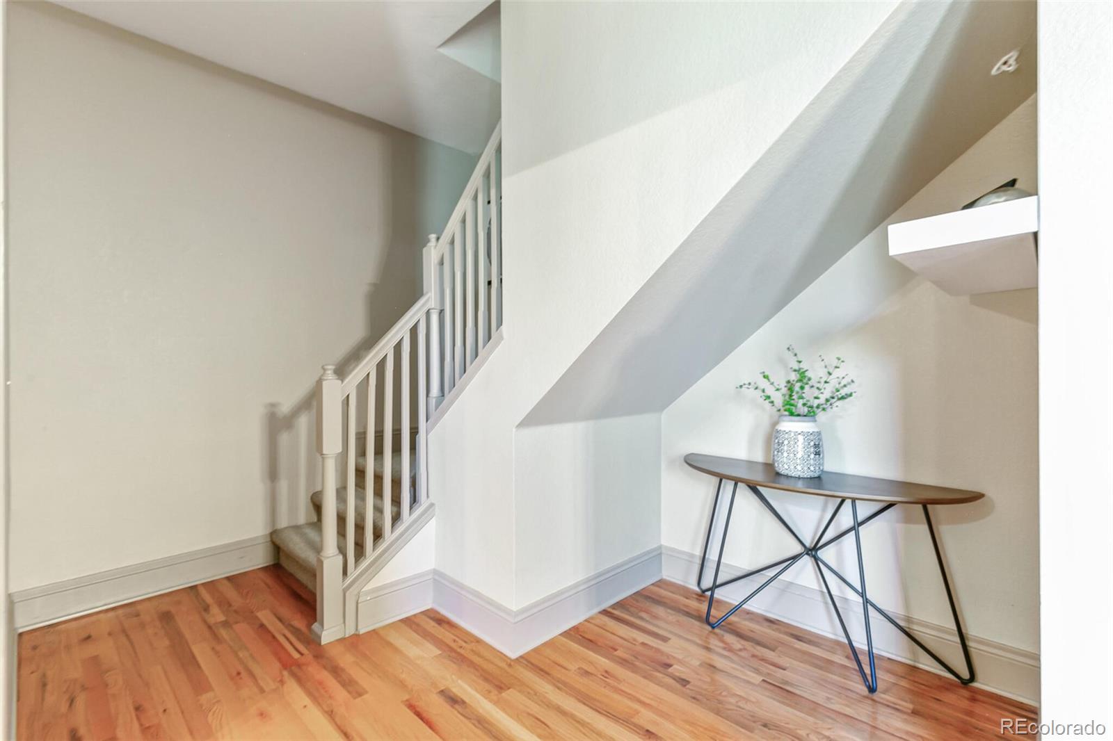 3211 Zuni Street, Unit 4 Denver, CO 80211 - Photo 21 of 35 a view of entryway with wooden floor