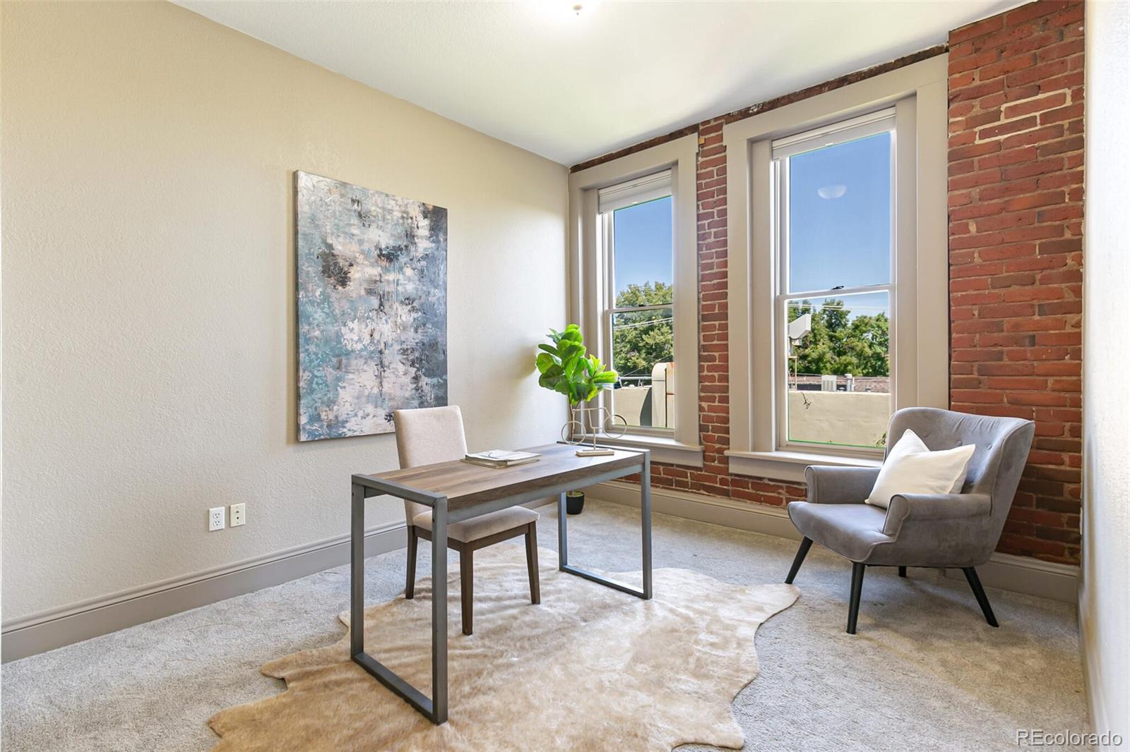 3211 Zuni Street, Unit 4 Denver, CO 80211 - Photo 28 of 35 a view of a workspace with furniture and a potted plant