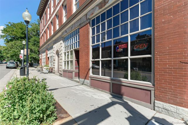 a view of a building with a window and balcony