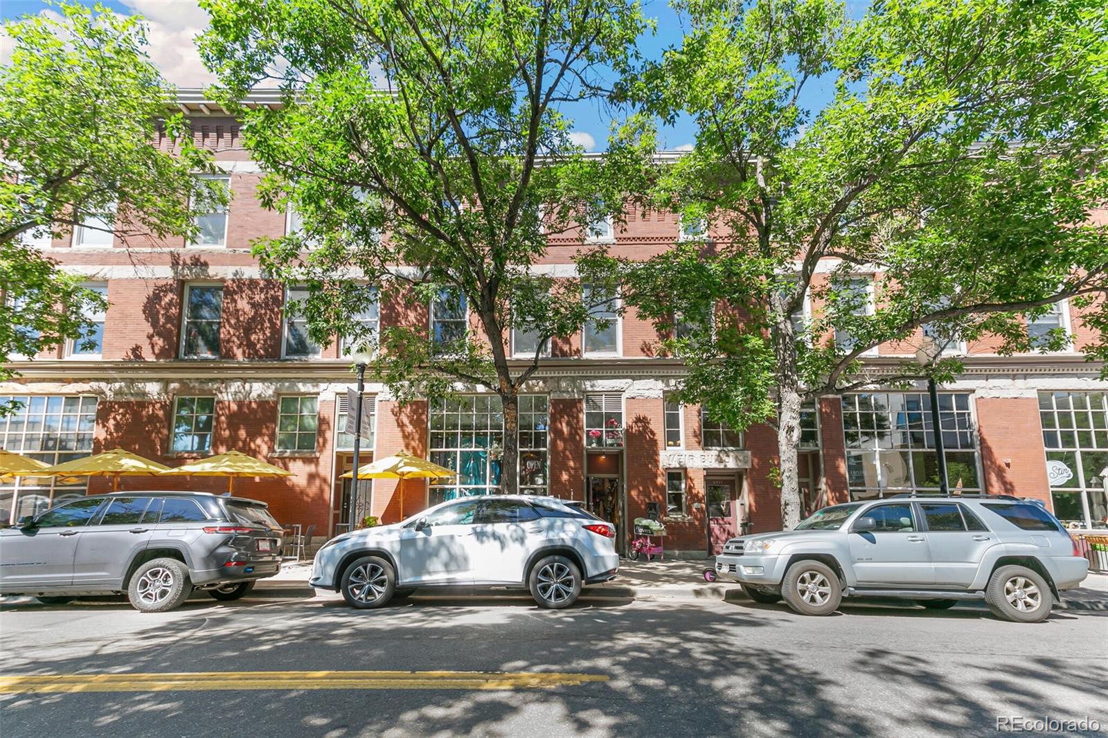 3211 Zuni Street, Unit 4 Denver, CO 80211 - Photo 34 of 35 a car parked in front of a house