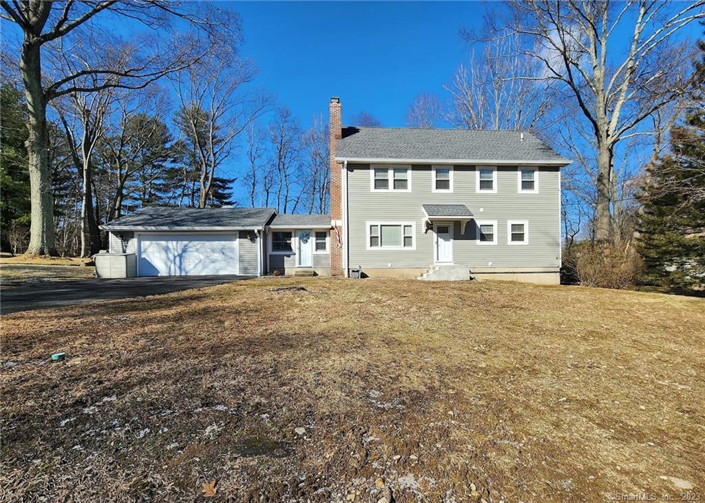 228 Putting Green Road Fairfield, CT 06825 - Photo 1 of 1 An inviting front lawn leads to front of house