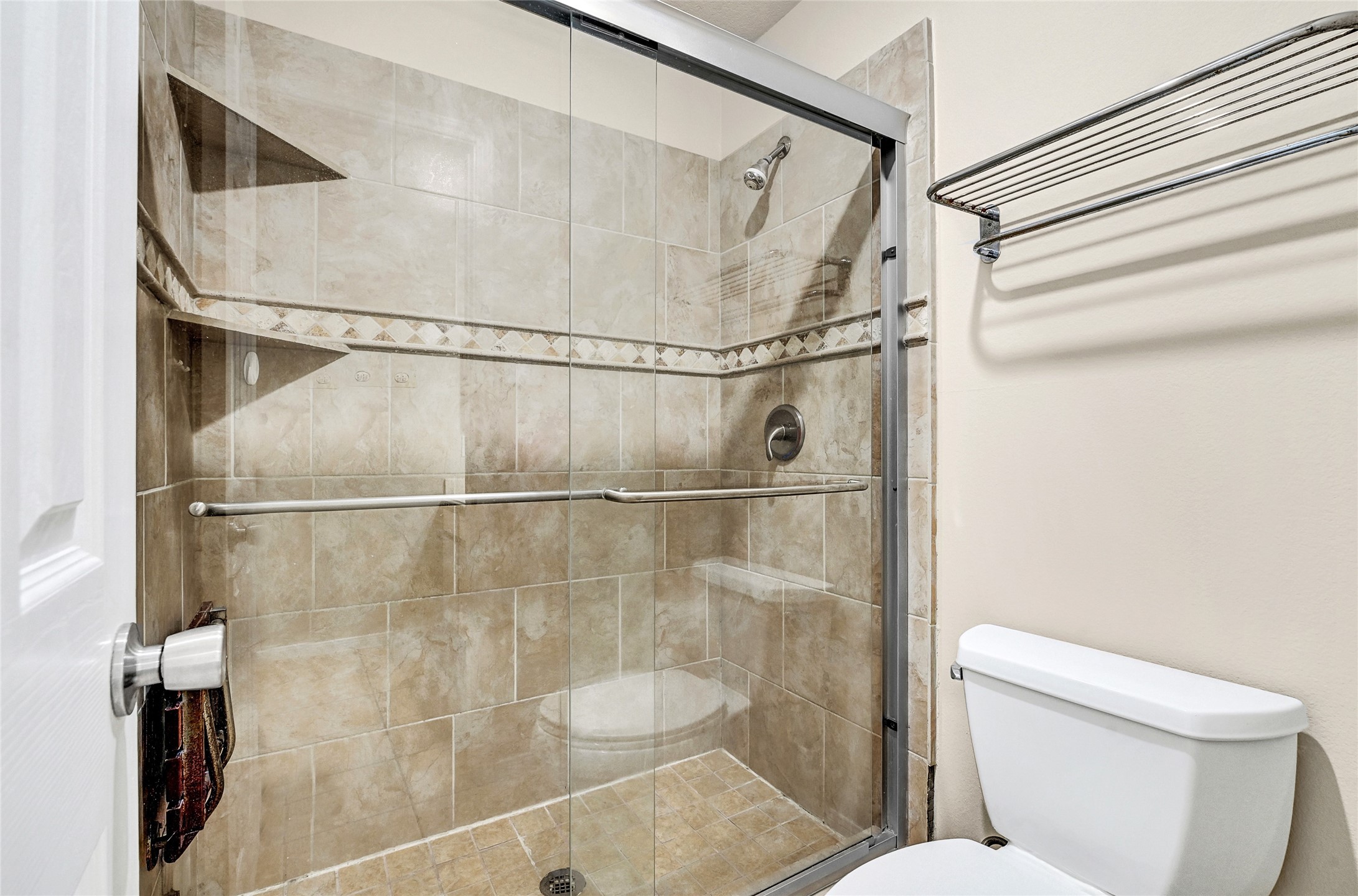 3603 Barkers Crossing Avenue Houston, TX 77084 - Photo 29 of 34 a bathroom with a toilet and a shower