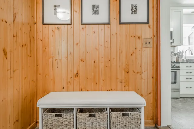 a room with a wooden table and chair