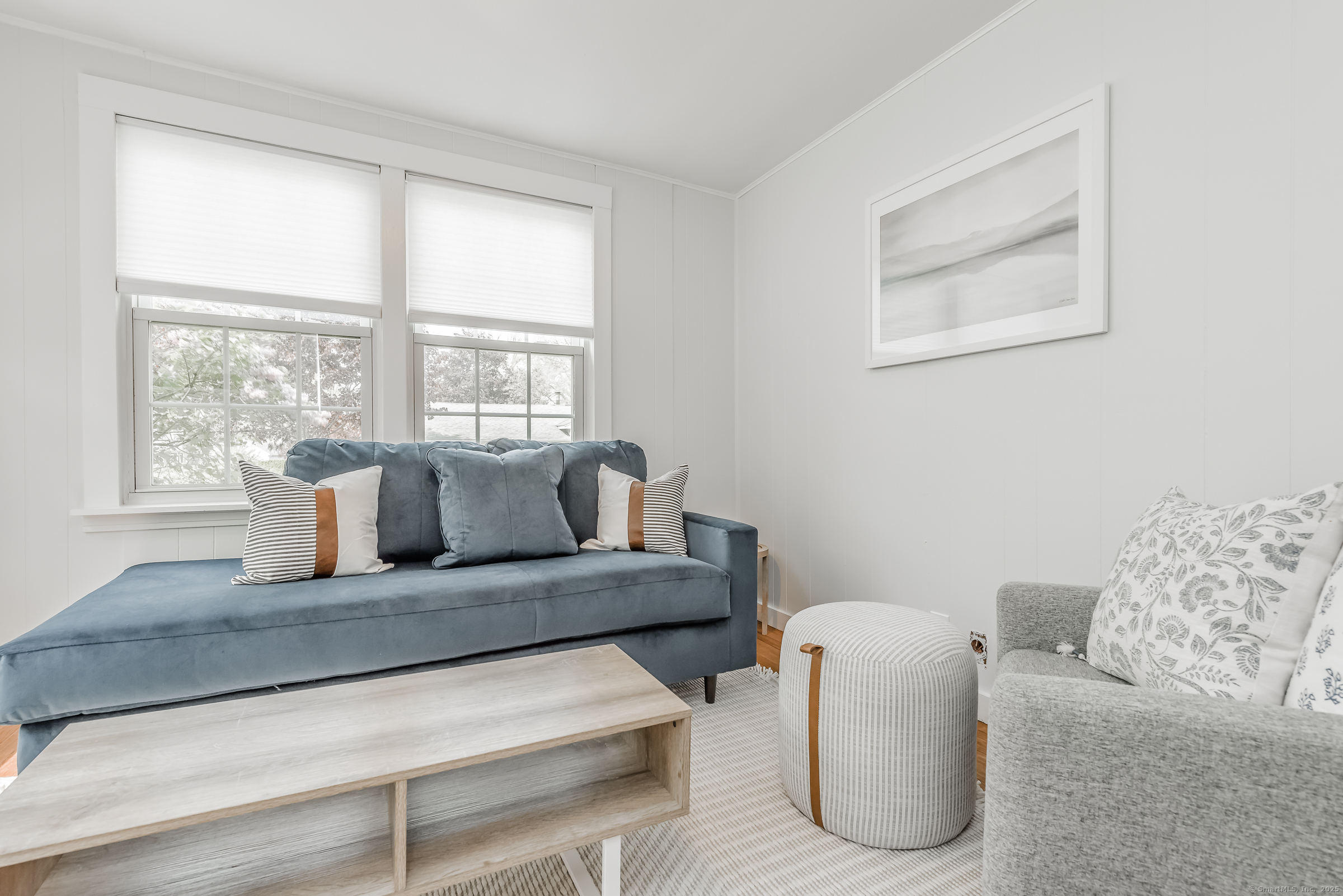 21 Elsmere Road Hebron, CT 06231 - Photo 16 of 31 a living room with furniture and a window