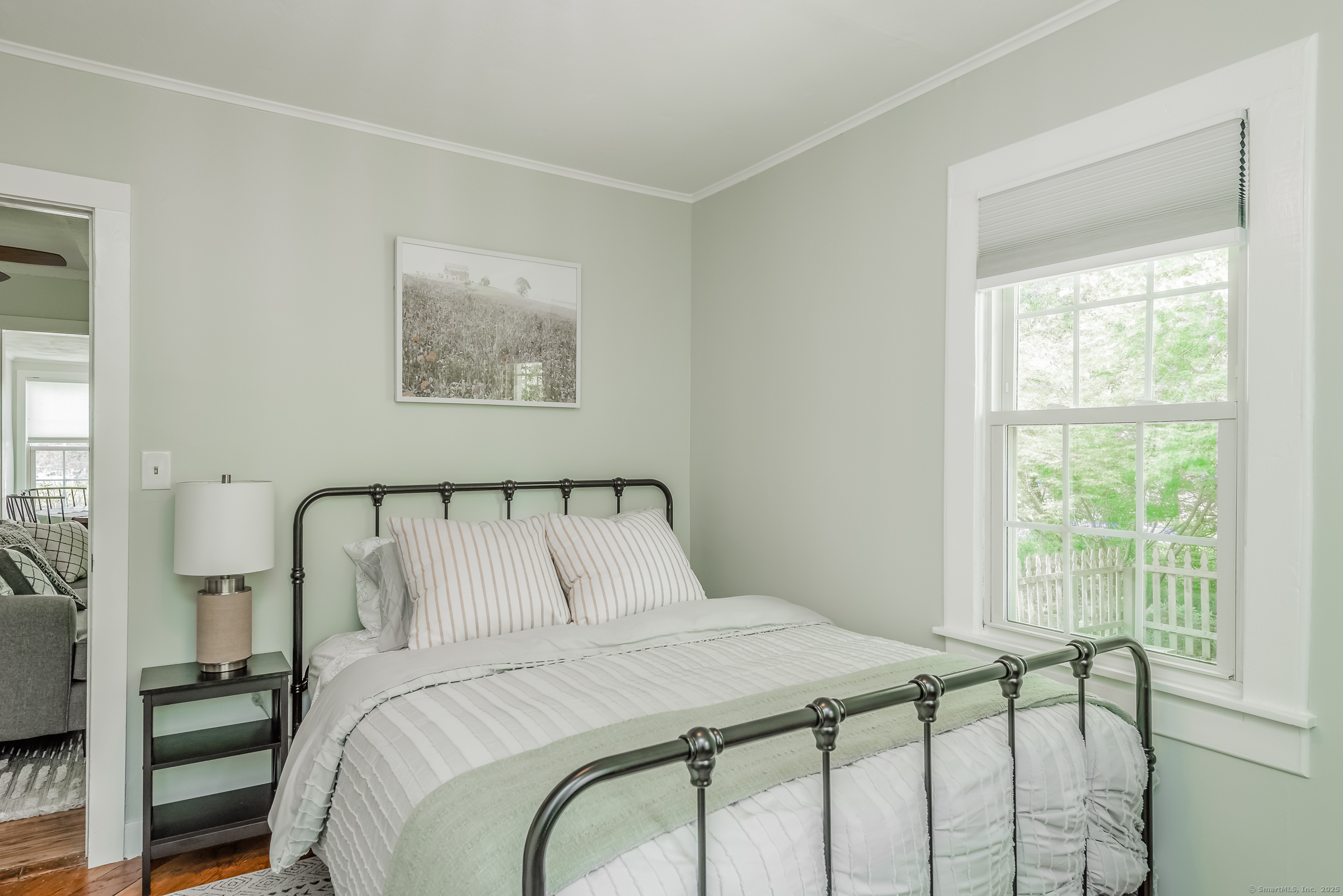 21 Elsmere Road Hebron, CT 06231 - Photo 17 of 31 a bedroom with a bed and a window