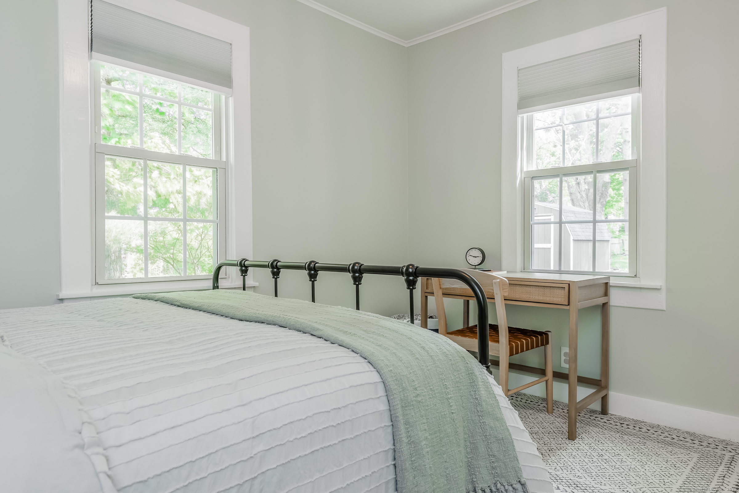 21 Elsmere Road Hebron, CT 06231 - Photo 18 of 31 a large bed sitting in a bedroom next to a window
