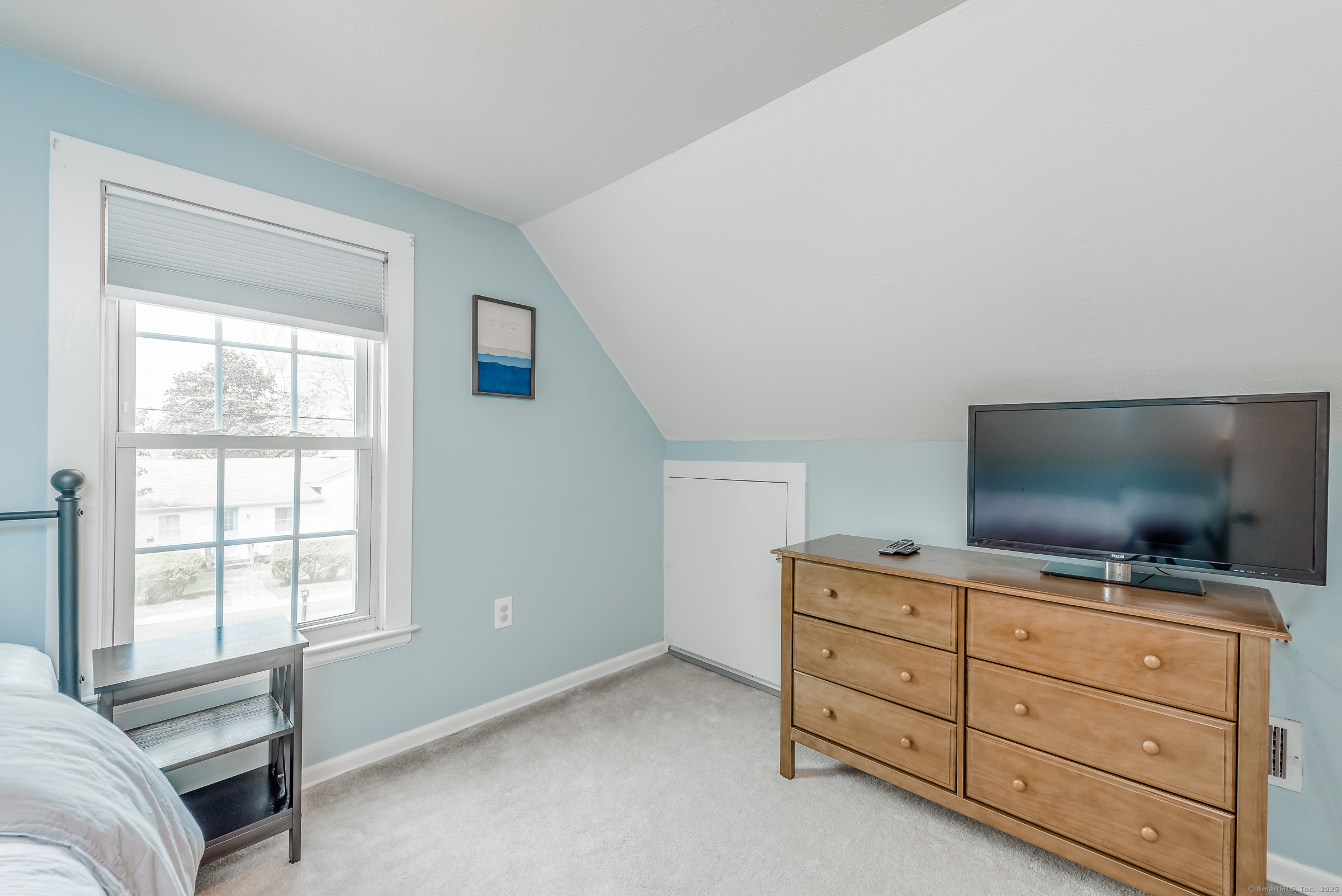 21 Elsmere Road Hebron, CT 06231 - Photo 21 of 31 a living room with furniture and flat screen tv