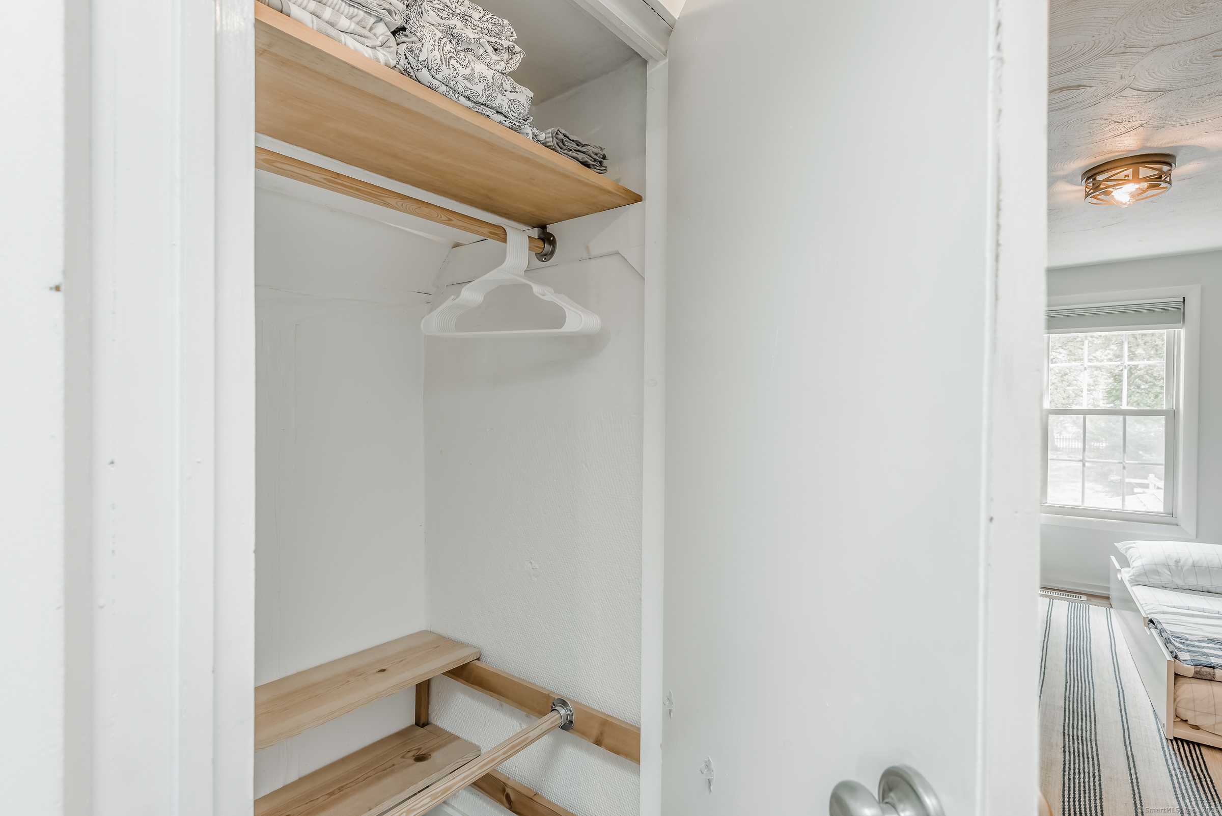 21 Elsmere Road Hebron, CT 06231 - Photo 22 of 31 a bathroom with a window and a shower