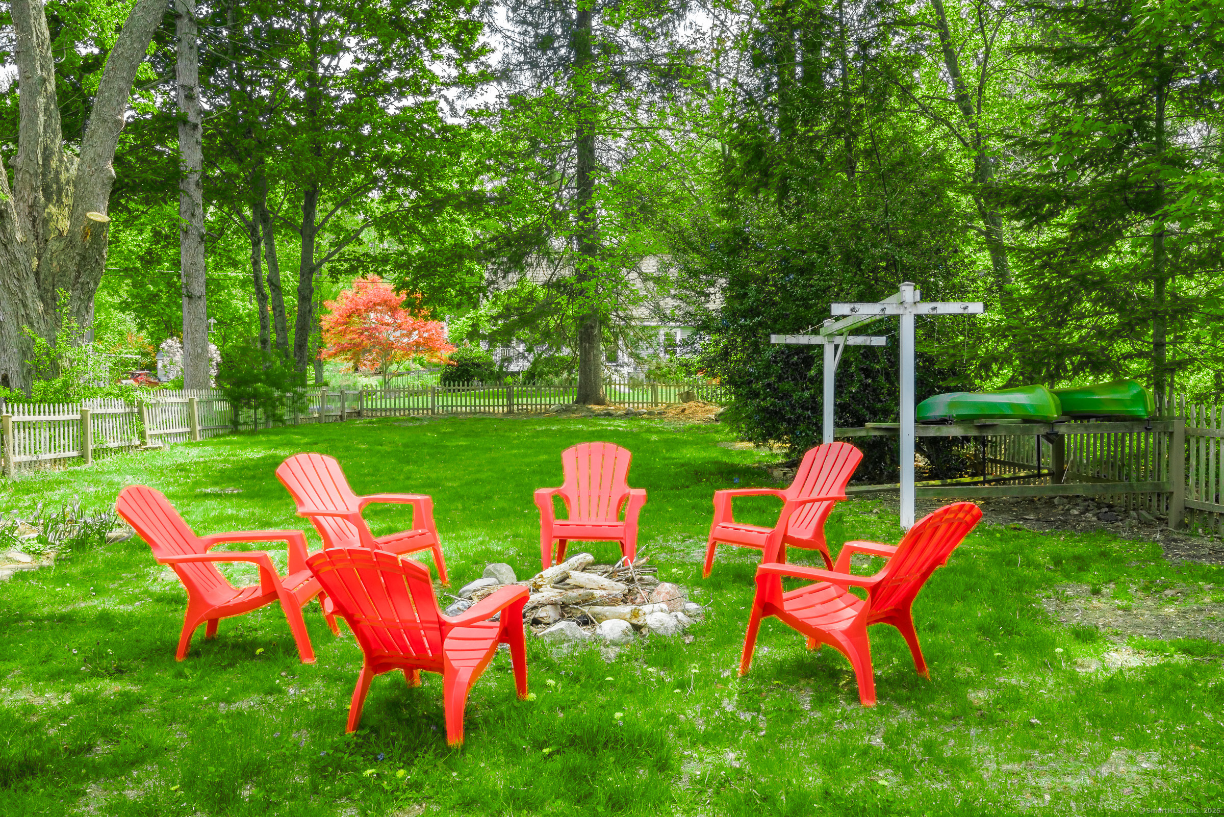 21 Elsmere Road Hebron, CT 06231 - Photo 27 of 31 a backyard of a house with outdoor seating