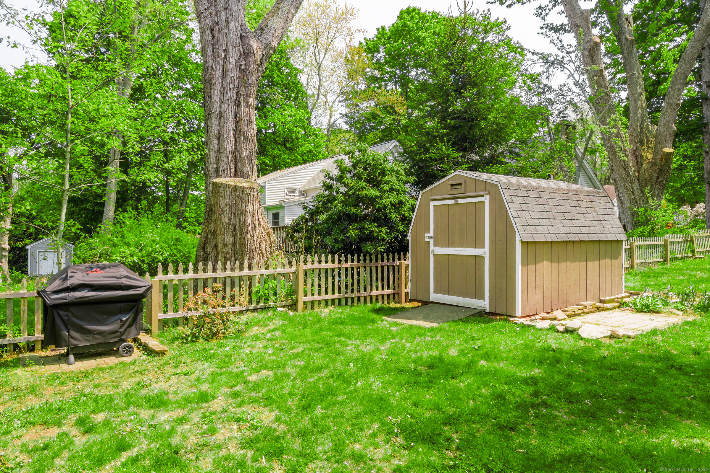 21 Elsmere Road Hebron, CT 06231 - Photo 29 of 31 a view of a house with backyard and a trees