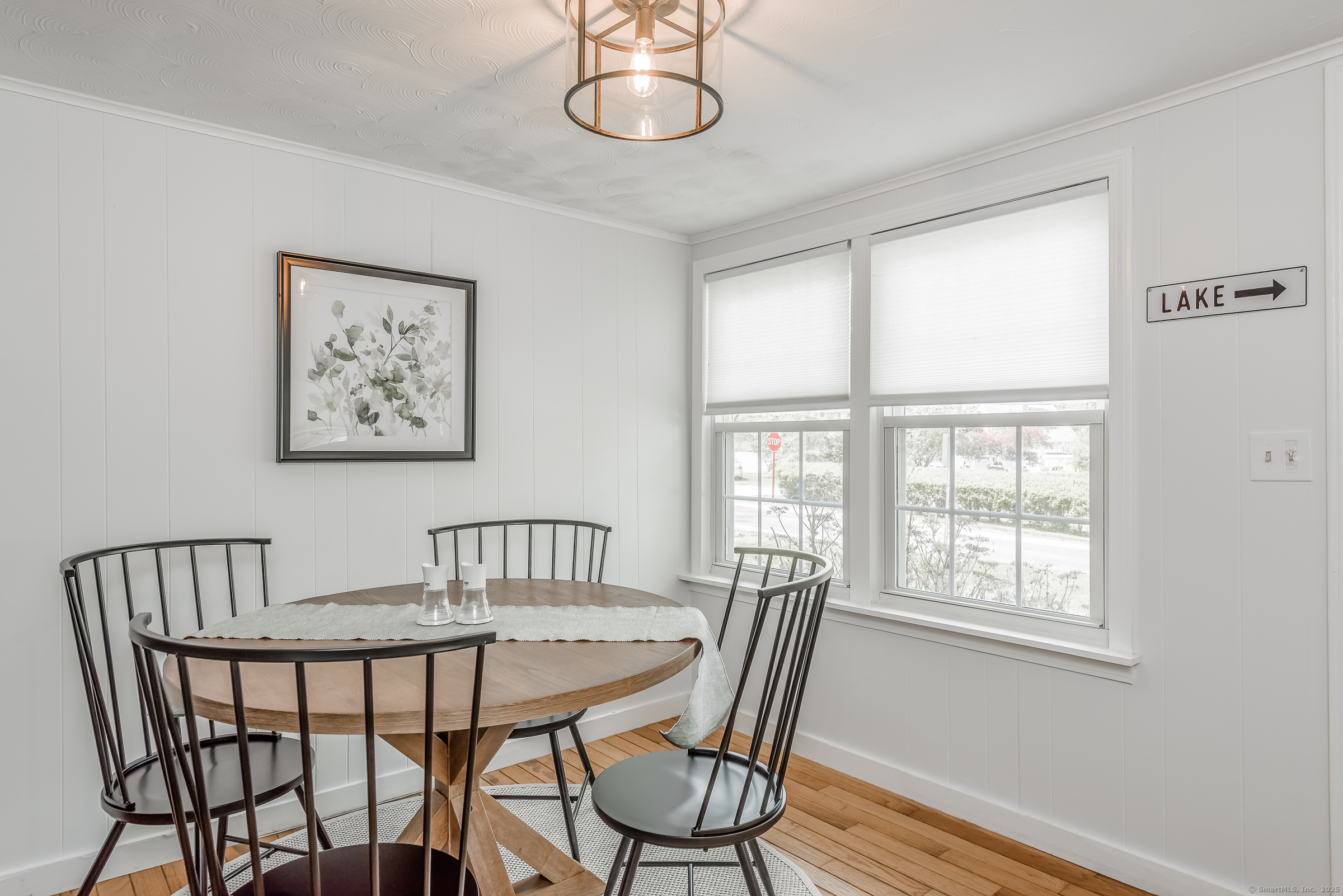 21 Elsmere Road Hebron, CT 06231 - Photo 3 of 31 a view of a dining room with furniture window and wooden floor