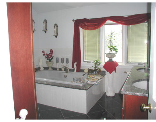 641 Marys Pond Road Rochester, MA 02770 - Photo 3 of 12 a bathroom with a granite countertop sink a mirror and vanity