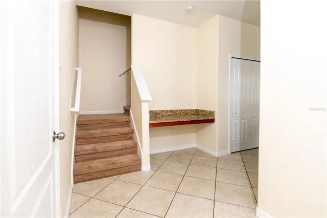 a view of entryway with white walls