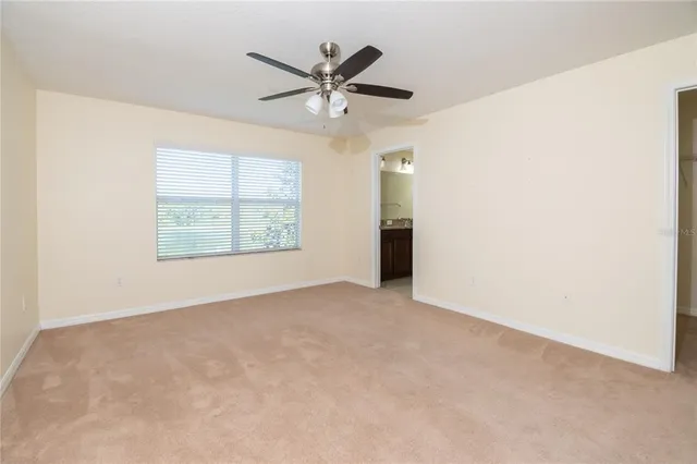 an empty room with a bathroom