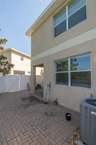 a view of a house with a flower plants