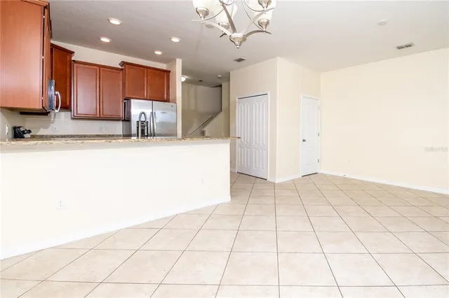 a view of a kitchen with a sink