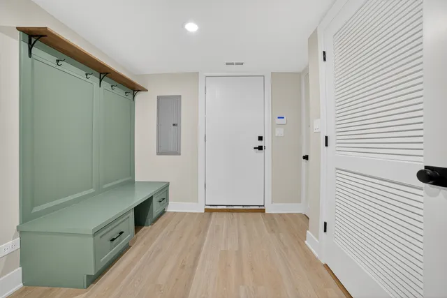 a view of a hallway with washer and dryer