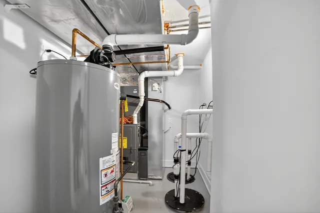 a view of a house with a wooden fence