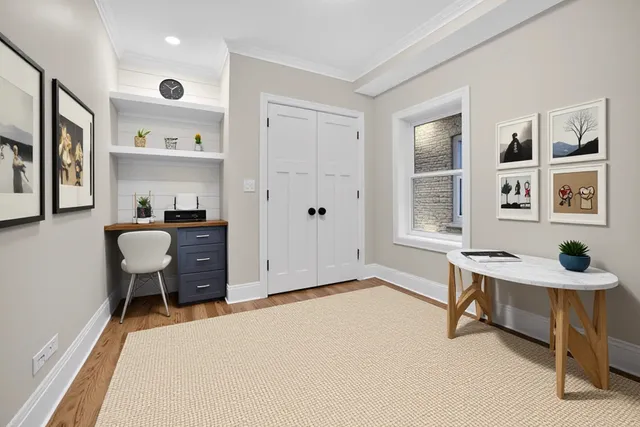 a bedroom with furniture and a window