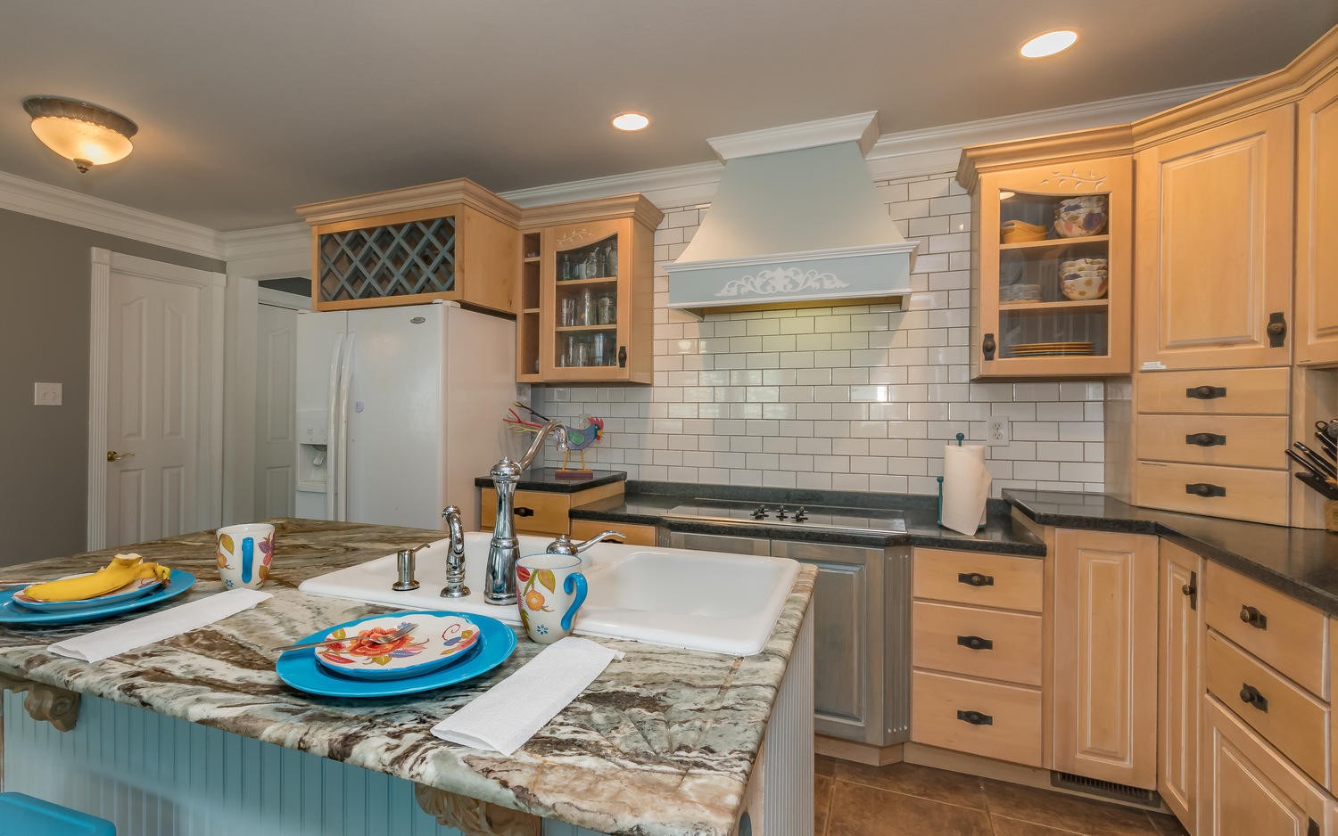3798 Dutch Valley Road Clinton, TN 37716 - Photo 11 of 37 a kitchen with stainless steel appliances granite countertop a sink and a wooden floor