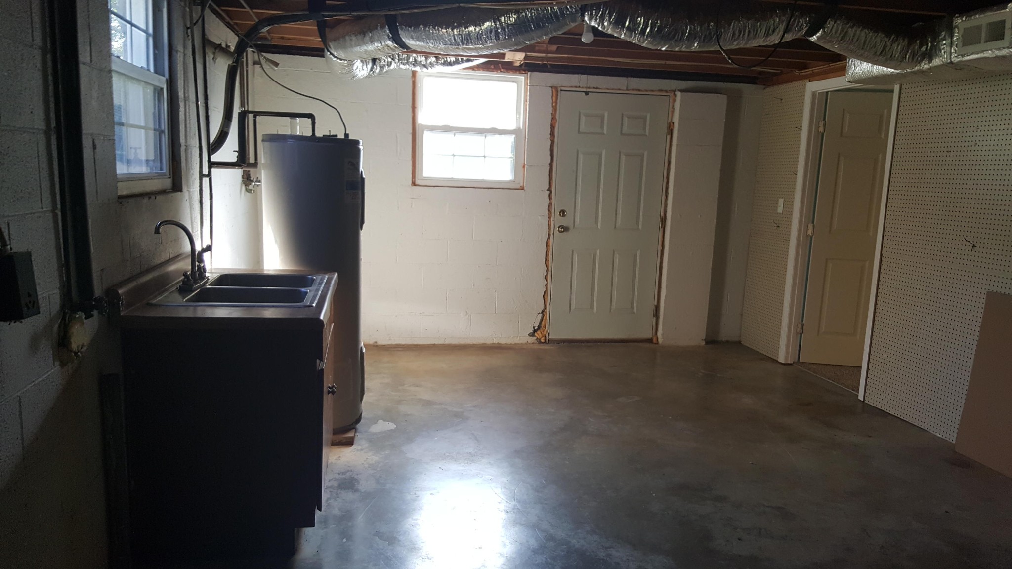 3798 Dutch Valley Road Clinton, TN 37716 - Photo 30 of 37 a view of a closet area with wooden floor