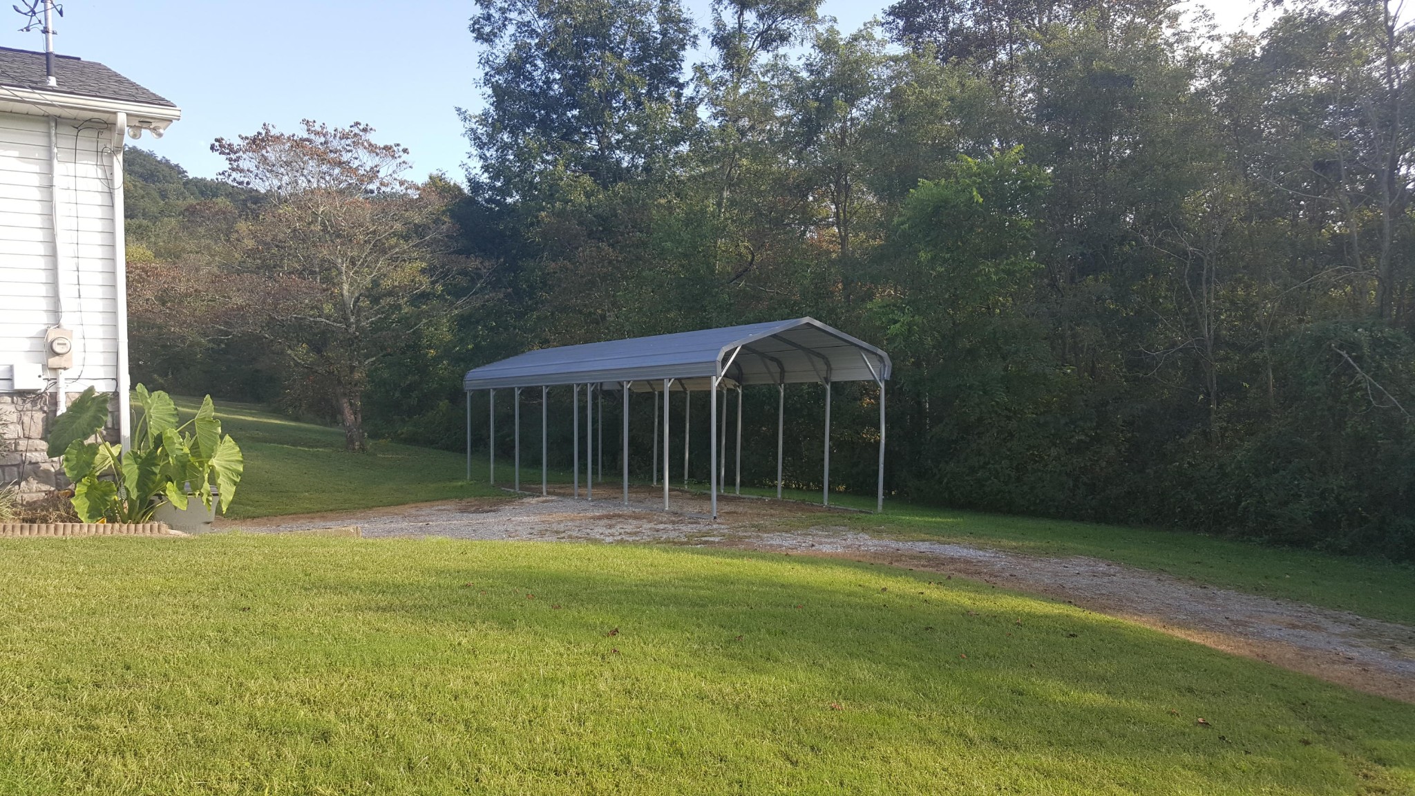 3798 Dutch Valley Road Clinton, TN 37716 - Photo 37 of 37 a backyard of a house with table and chairs