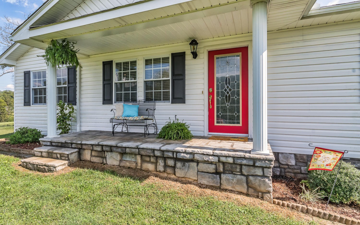 3798 Dutch Valley Road Clinton, TN 37716 - Photo 4 of 37 a front view of a house with swimming pool and chairs