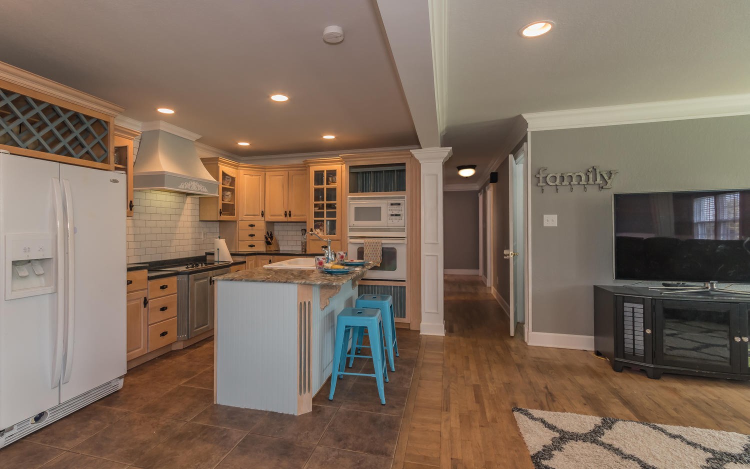 3798 Dutch Valley Road Clinton, TN 37716 - Photo 9 of 37 a kitchen with refrigerator and cabinets