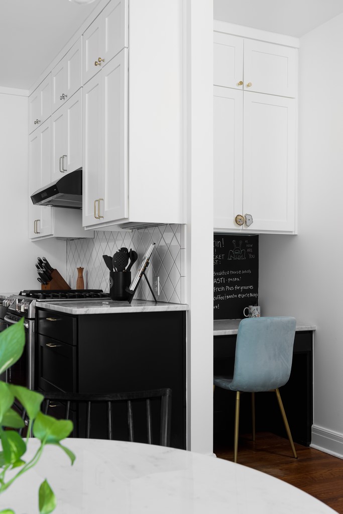3812 Duval Street Austin, TX 78751 - Photo 15 of 22 a kitchen with stainless steel appliances a stove a sink and a refrigerator
