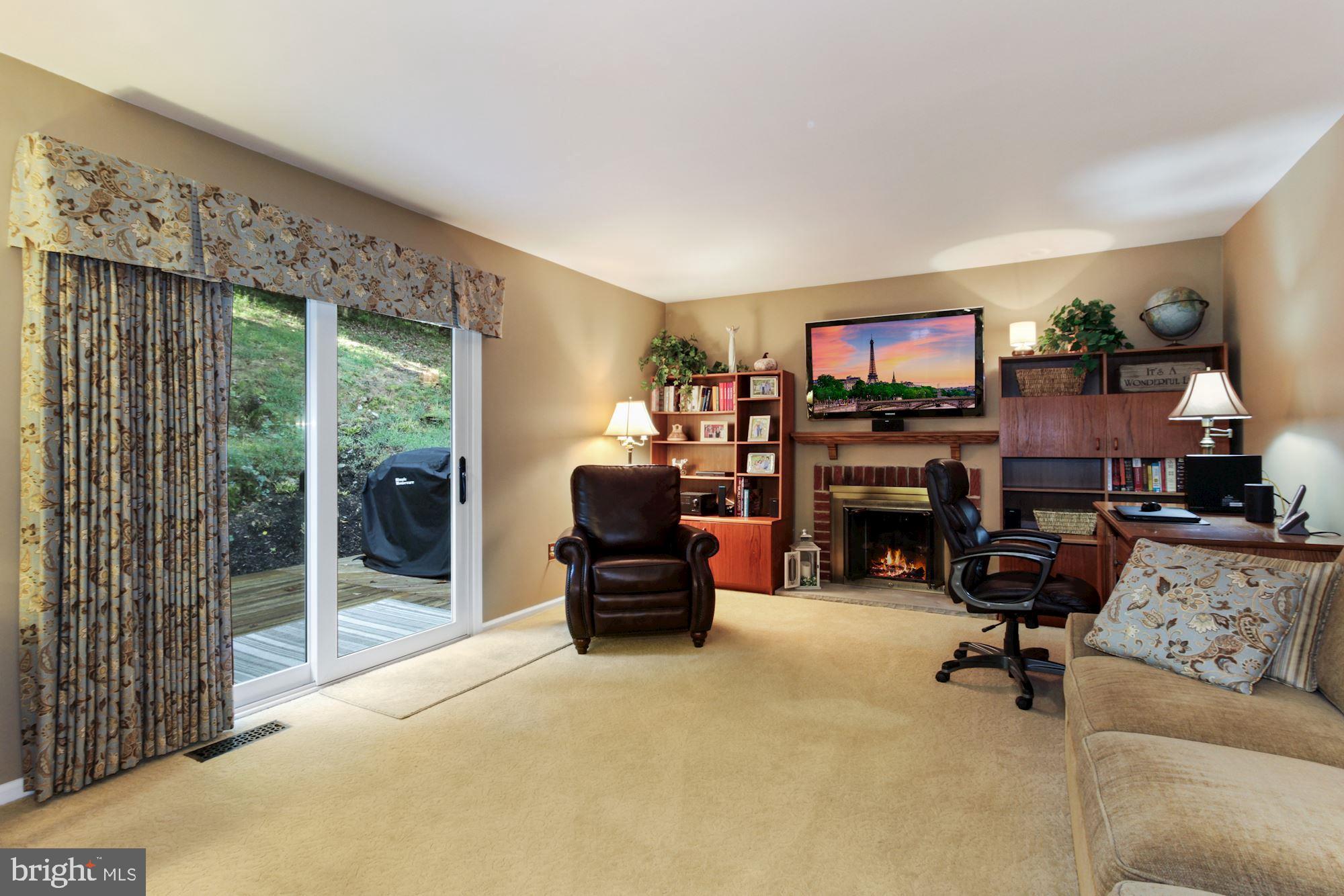 52 Old Lancaster Road Malvern, PA 19355 - Photo 15 of 45 family room with gas fireplace